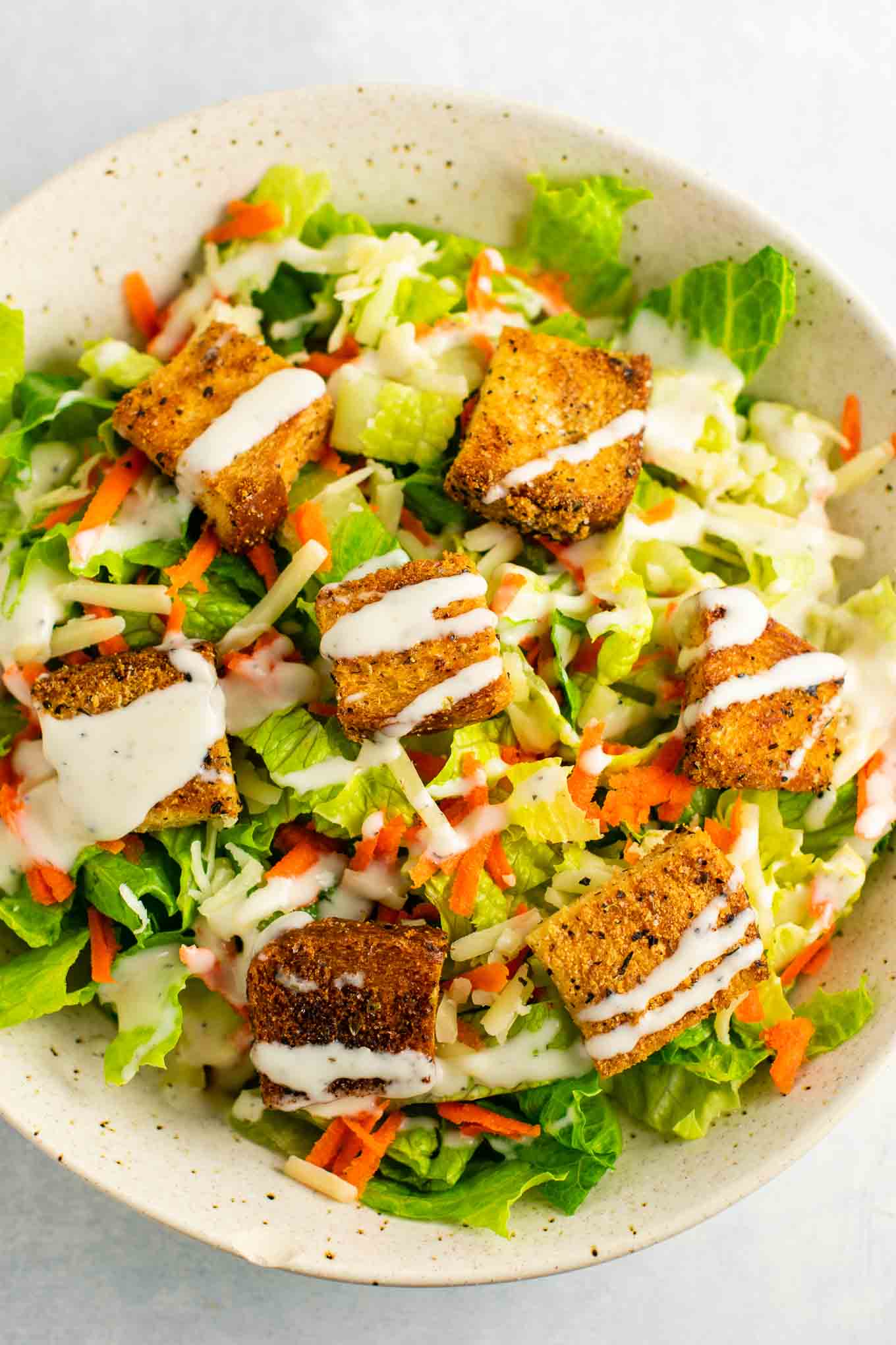 croutons on top of a salad