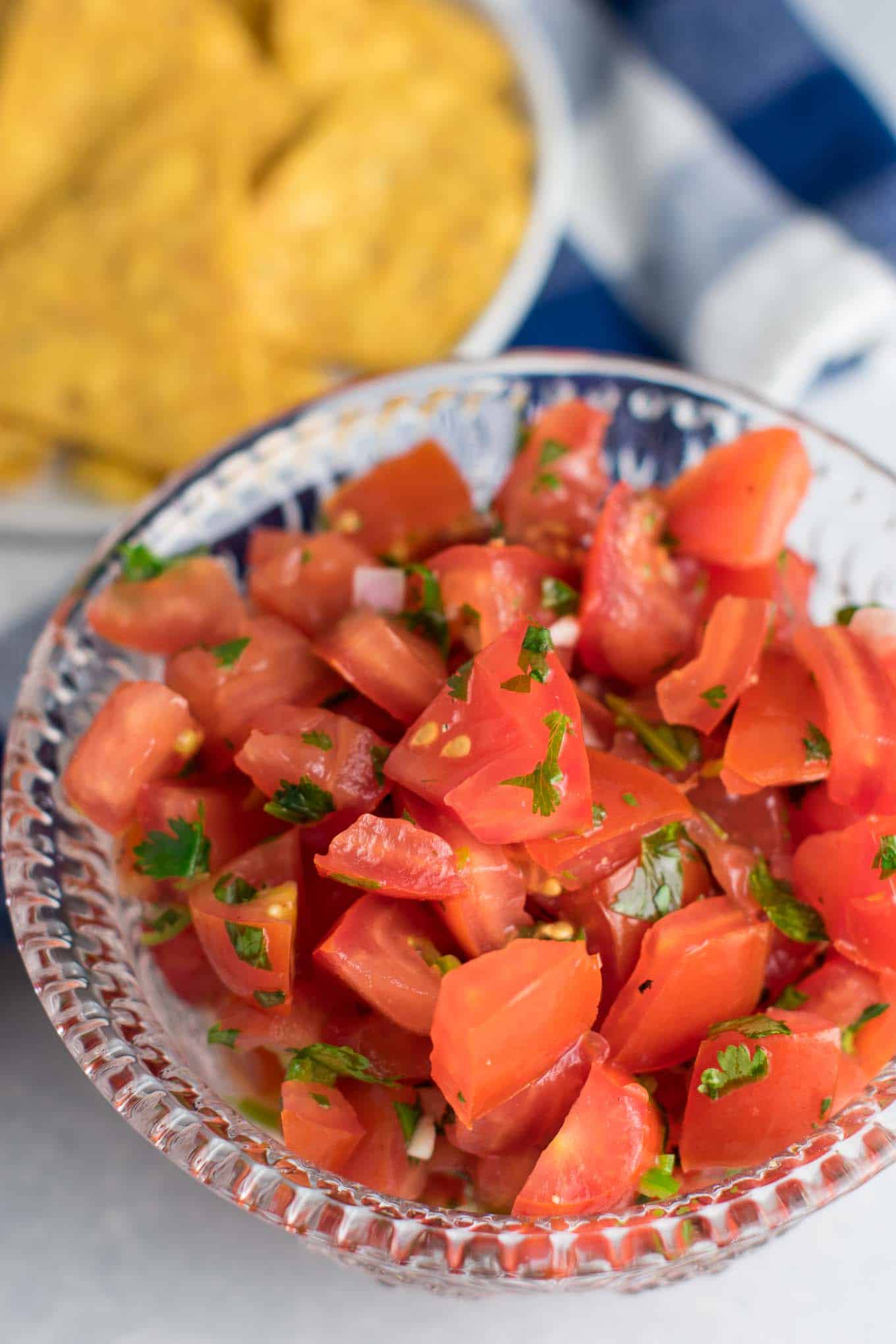 Easy Homemade Fresh Salsa recipe – take mexican night to the next level or serve alone with chips, either way you’ll love it! #vegan #homemadesalsa #picodegallo