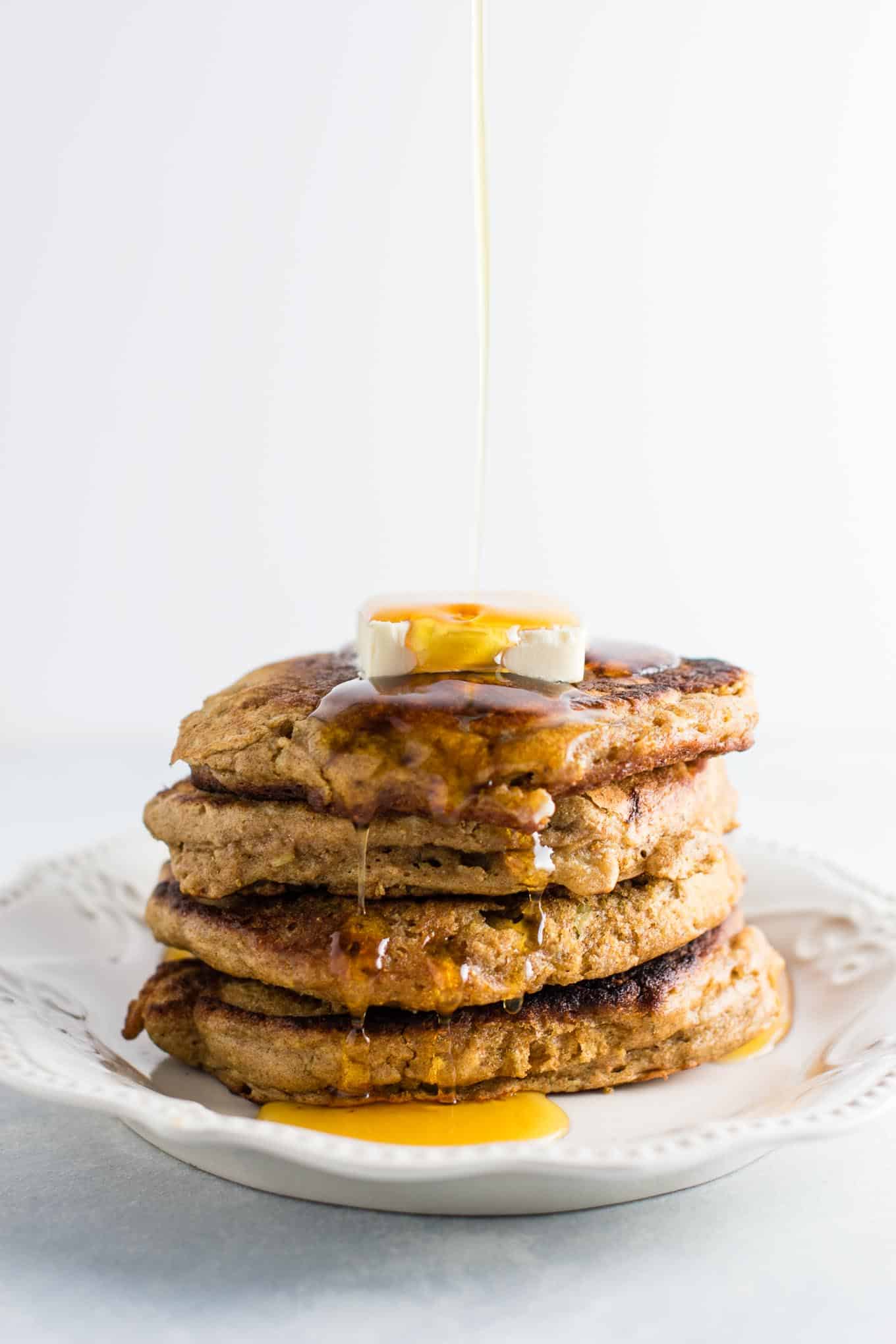 Healthy banana bread pancakes made with greek yogurt and whole wheat flour. These are amazing! #healthy #breakfast #bananabread #bananapancakes #pancakes #greekyogurt #wholewheat