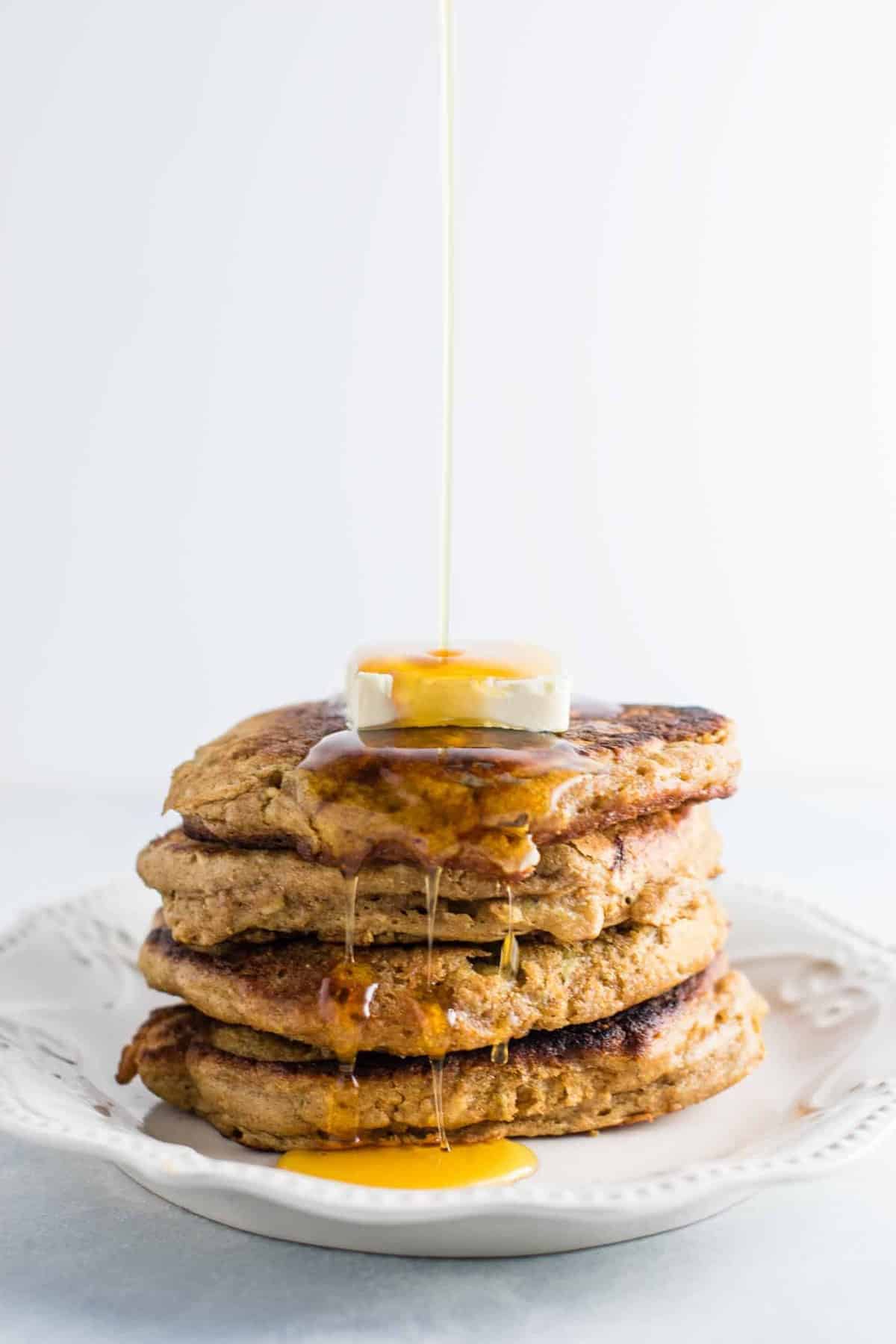 Healthy banana bread pancakes made with greek yogurt and whole wheat flour. These are amazing! #healthy #breakfast #bananabread #bananapancakes #pancakes #greekyogurt #wholewheat