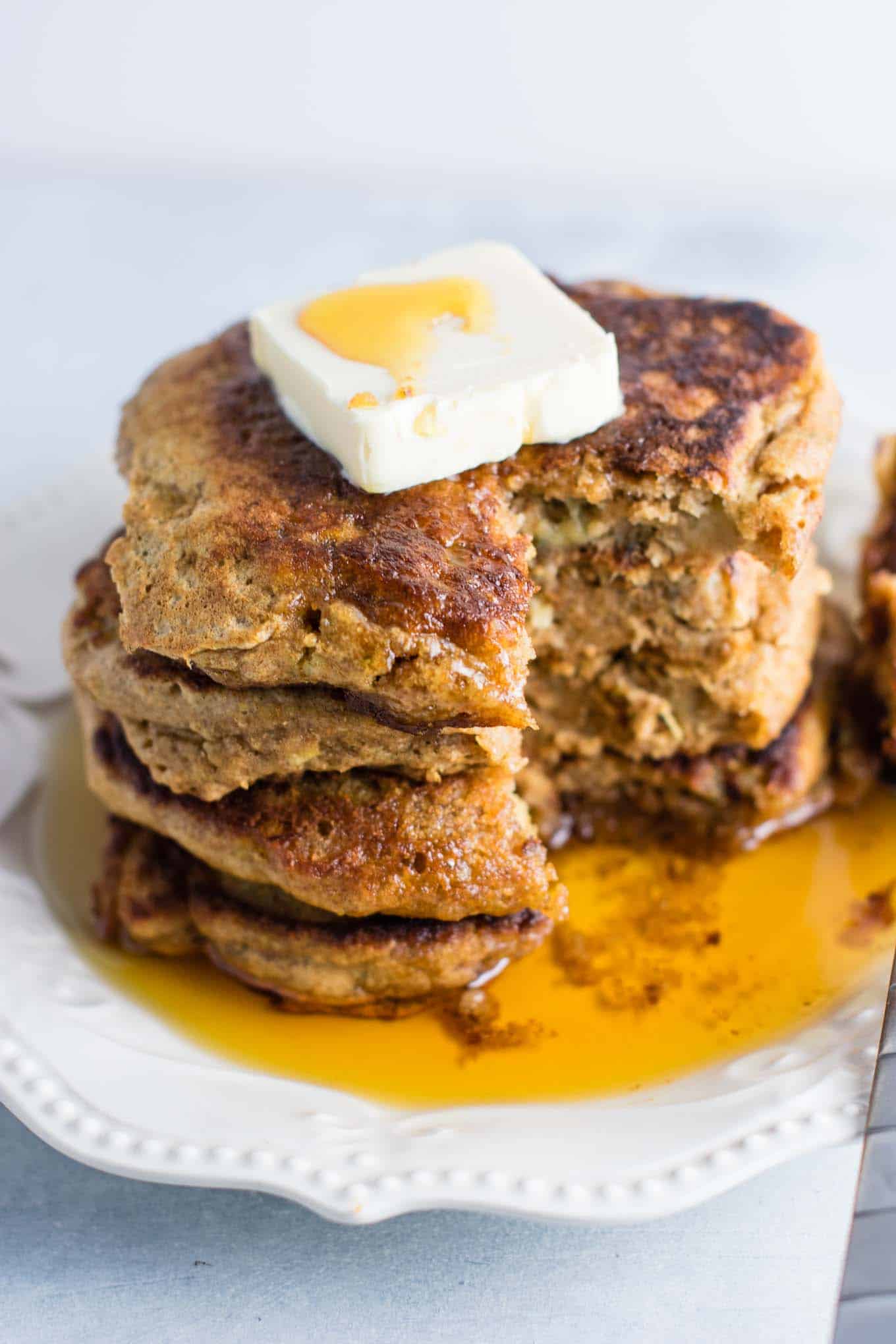 Healthy banana bread pancakes made with greek yogurt and whole wheat flour. These are amazing! #healthy #breakfast #bananabread #bananapancakes #pancakes #greekyogurt #wholewheat