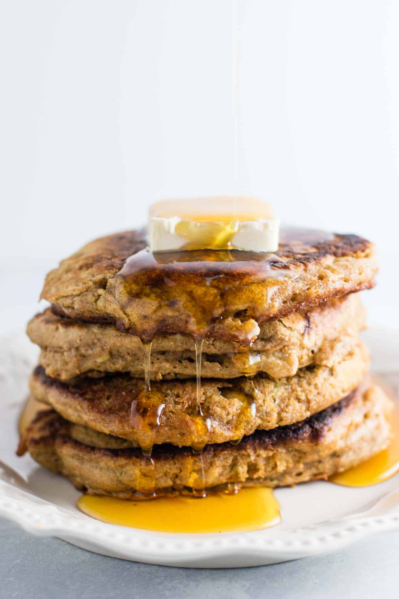 Healthy banana bread pancakes made with greek yogurt and whole wheat flour. These are amazing! #healthy #breakfast #bananabread #bananapancakes #pancakes #greekyogurt #wholewheat