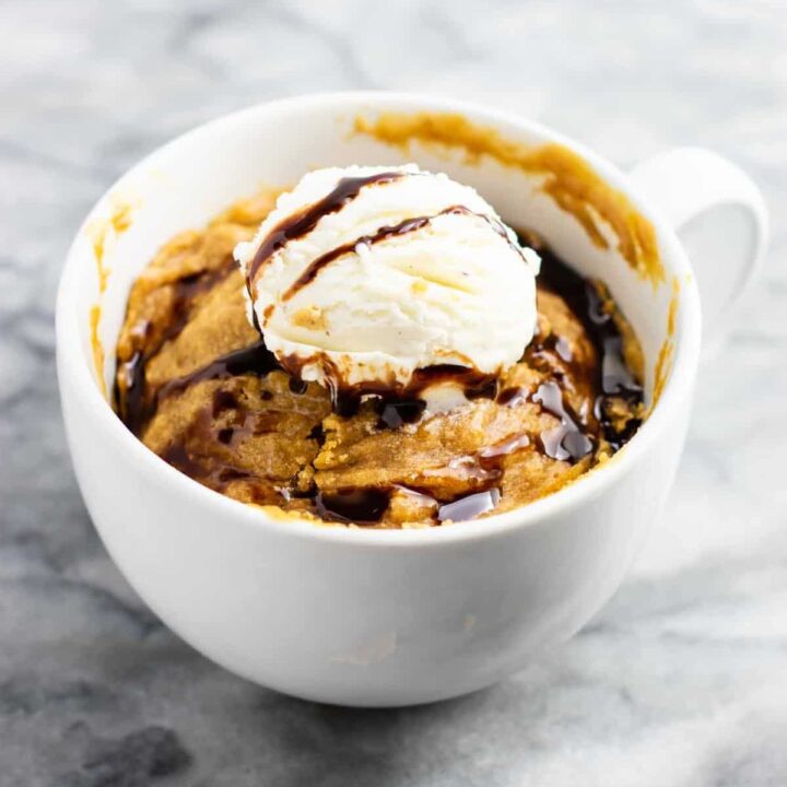 Microwave peanut butter cookie in a mug – gluten free dairy free, and refined sugar free! This tastes amazing and is so good with ice cream! #dessert #glutenfree #dairyfree #mugcake #peanutbuttercookie #peanutbuttermugcake