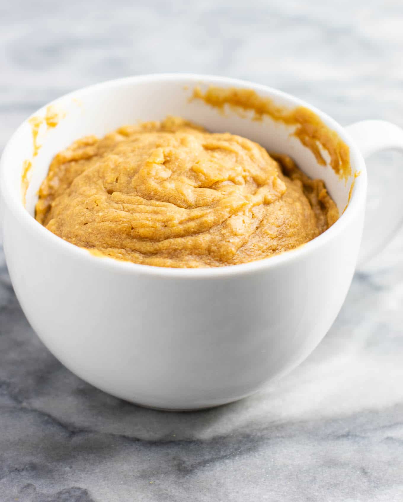 Microwave peanut butter cookie in a mug – gluten free dairy free, and refined sugar free! This tastes amazing and is so good with ice cream! #dessert #glutenfree #dairyfree #mugcake #peanutbuttercookie #peanutbuttermugcake