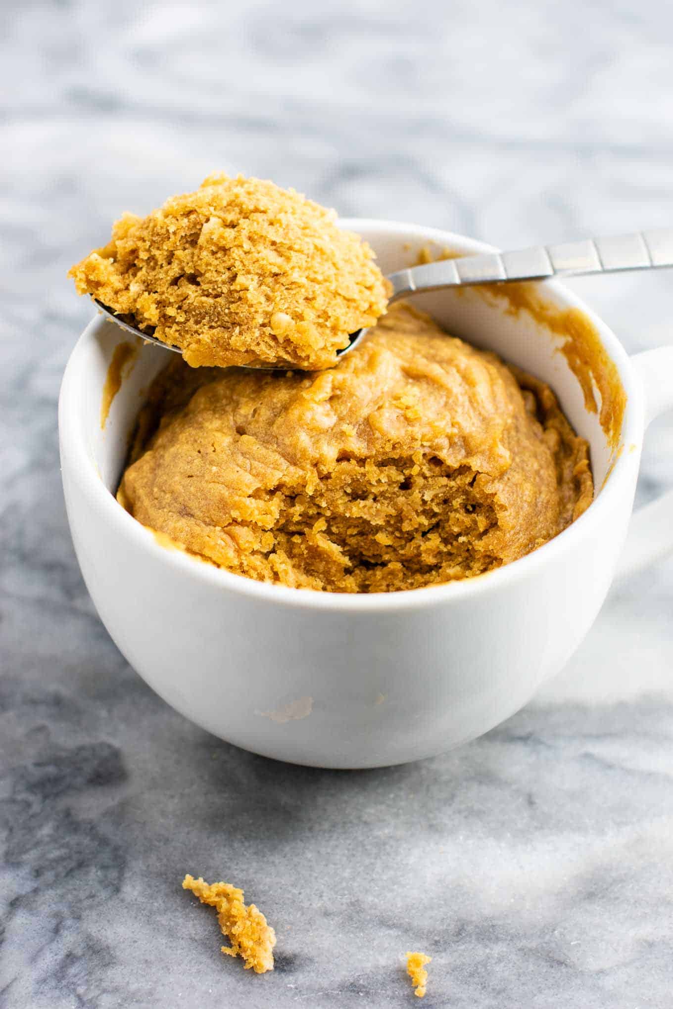 Microwave peanut butter cookie in a mug – gluten free dairy free, and refined sugar free! This tastes amazing and is so good with ice cream! #dessert #glutenfree #dairyfree #mugcake #peanutbuttercookie #peanutbuttermugcake