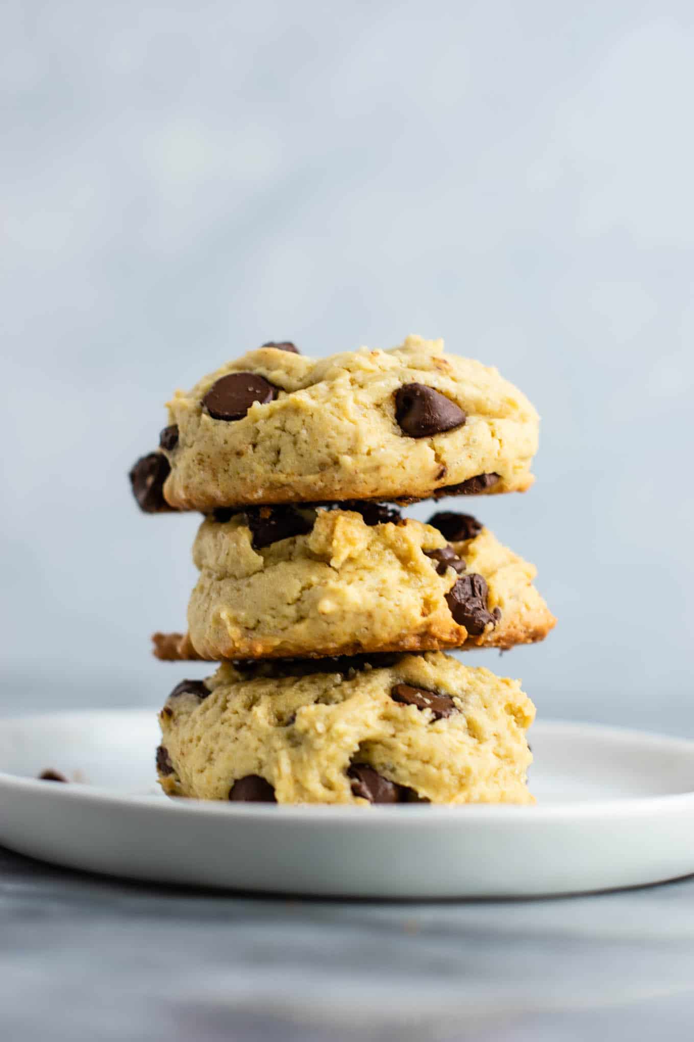 applesauce chocolate chip cookies stacked on a plate