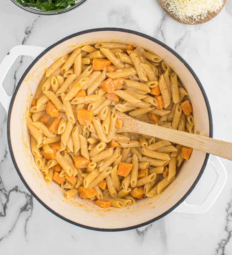 sweet potato pasta being stirred