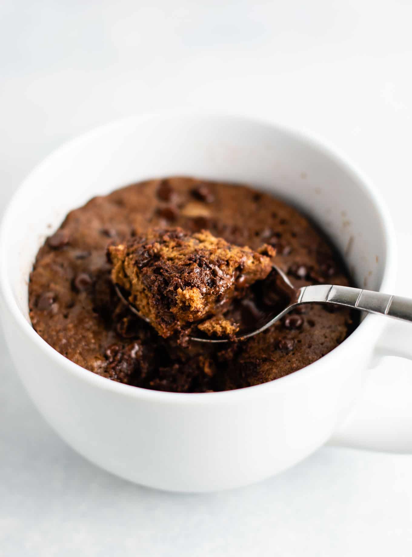 how to make a chocolate mug cake with oat flour and coconut flour. This is the BEST texture gluten free mug cake!
