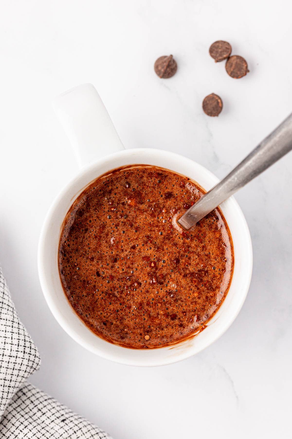 stirring the mug cake ingredients together