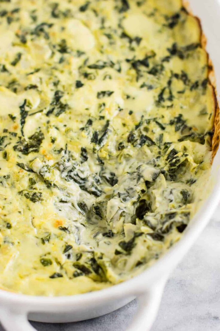 The best creamy spinach artichoke dip recipe with Havarti and parmesan cheese. This is a hit every time I make it! #spinachartichokedip #appetizer #spinachdip #vegetarian #havarti #parmesan #dips