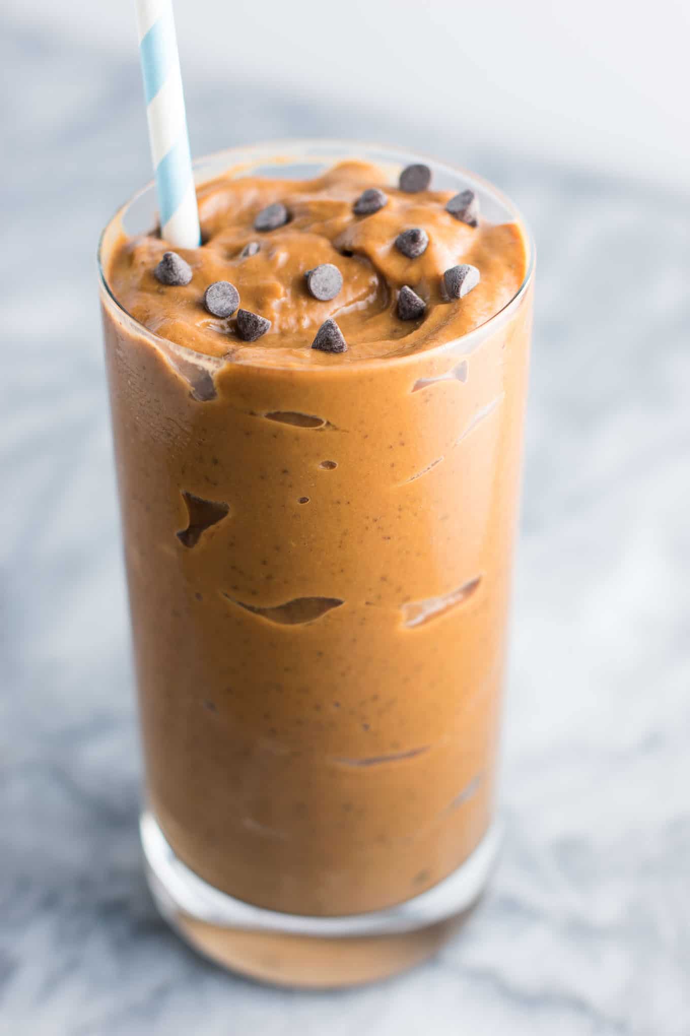 Healthy chocolate milkshake recipe made with just 5 ingredients. You won't believe the secret ingredient that makes it so creamy!
