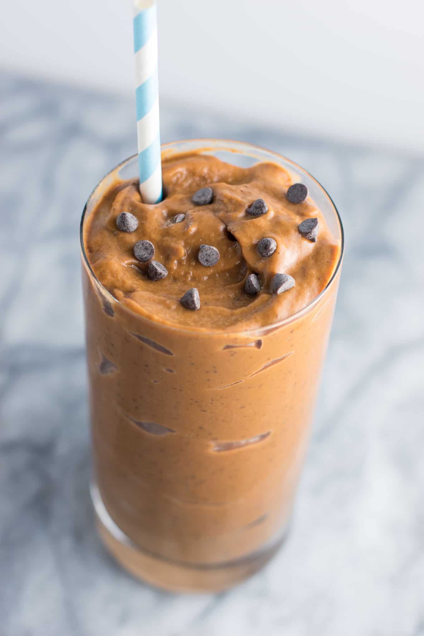 Healthy chocolate milkshake recipe made with just 5 ingredients. You won't believe the secret ingredient that makes it so creamy!