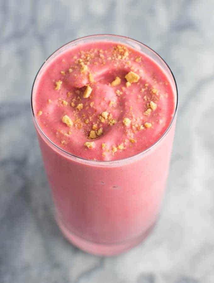 This skinny strawberry cheesecake smoothie recipe is made with just 5 ingredients and healthy enough to eat for breakfast!
