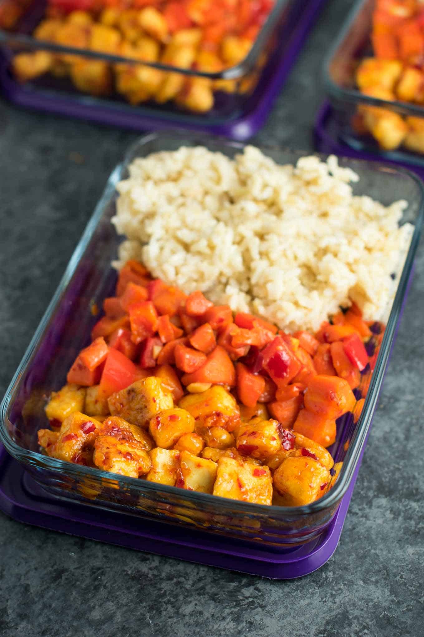 Meal Prep Sweet Chili Tofu Bowls with brown rice and vegetables. A delicious vegan or vegetarian meal! #vegan #vegetarian #veganmealprep #tofu