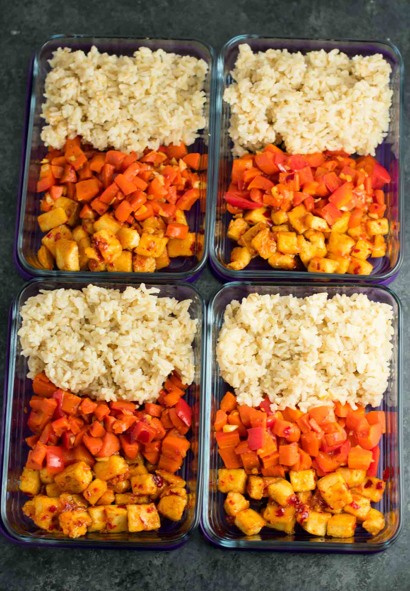 Meal Prep Sweet Chili Tofu Bowls with brown rice and vegetables. A delicious vegan or vegetarian meal! #vegan #vegetarian #veganmealprep #tofu