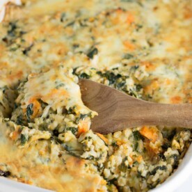 Sweet Potato Brown Rice Casserole made with greek yogurt, mushrooms, spinach, mozzarella, parmesan, and cheddar cheese - a hearty vegetarian comfort food recipe. No cream of anything soup! #casserole #vegetarian #sweetpotatobrownricecasserole #brownrice
