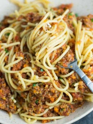 Vegetable bolognese recipe made with mushrooms, carrots, celery, garlic, and onion. A delicious meatless vegetarian "meat" sauce recipe. #vegetablebolognese #vegan #vegetarian #bologneserecipe