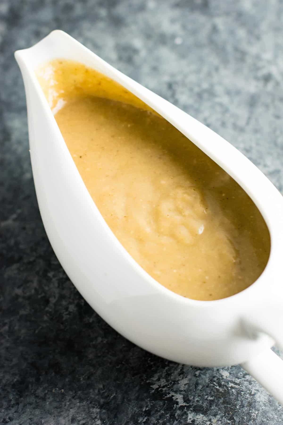 vegetarian thanksgiving menu - How to make vegetarian gravy - this is the BEST gravy I have ever had, with or without meat! Seriously incredible and everyone will be wanting some at Thanksgiving! #gravy #vegetarian #mushroomgravy #vegan #vegetarianthanksgiving
