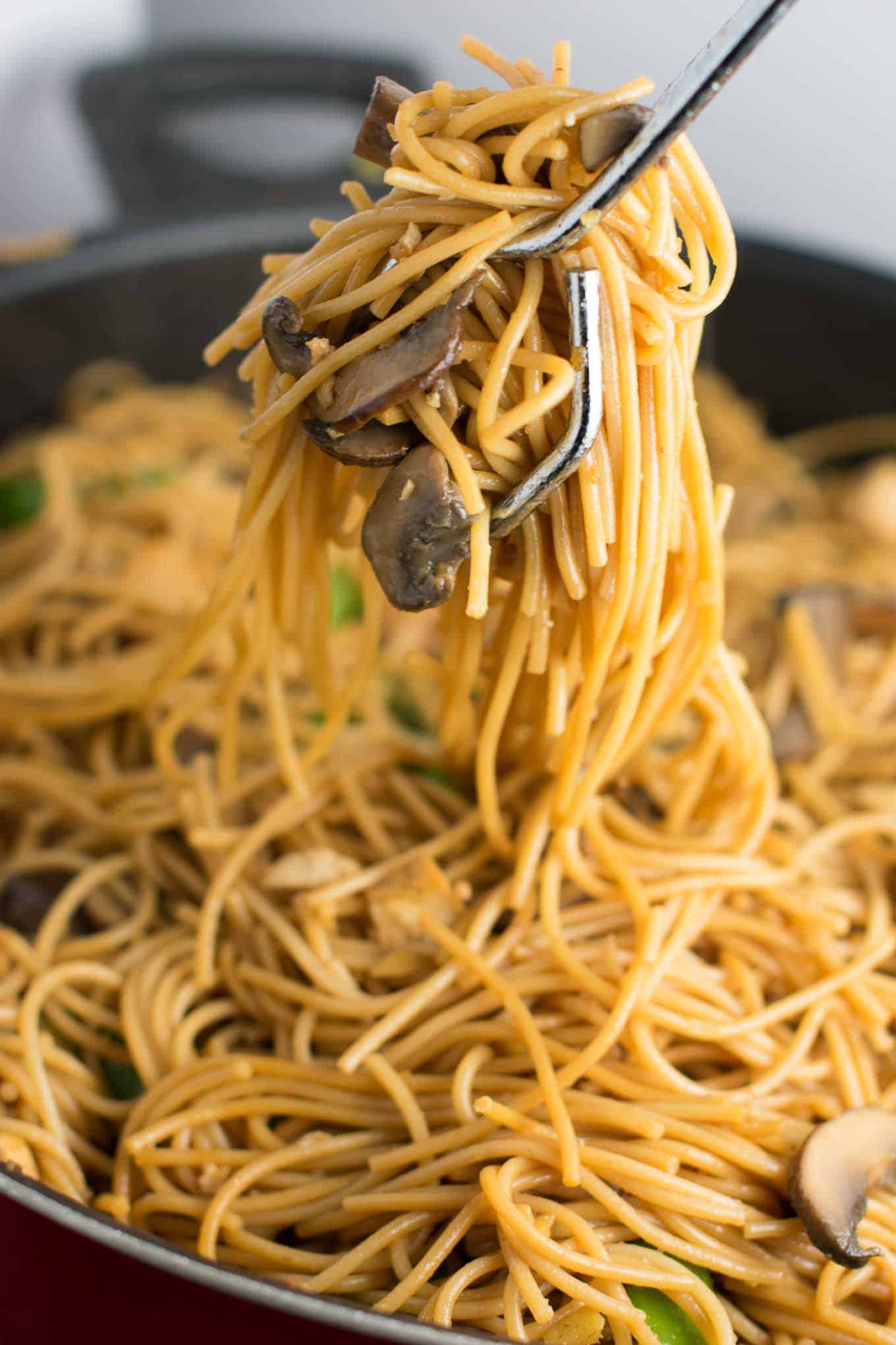 Easy Tofu Lo Mein recipe with fresh vegetables and a simple sauce. Ready in minutes and packed full of protein! #tofu #lomein #vegan #vegetarian