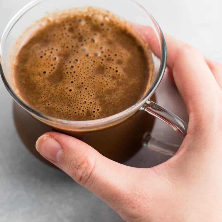 Easy 4 Ingredient hot chocolate recipe made with almond milk. Dairy free, gluten free, and vegan. The perfect cozy winter drink! #vegan #hotchocolate #drinks #christmas #dairyfree