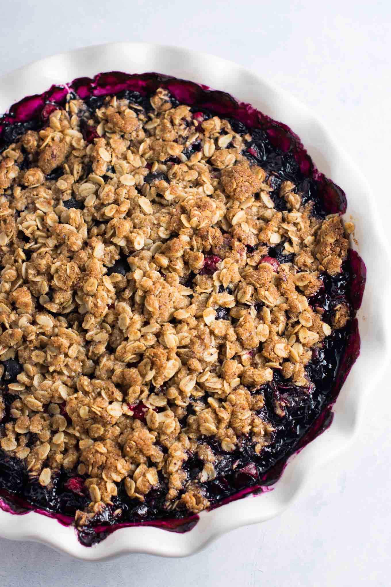 cranberry blueberry crisp in a pie dish