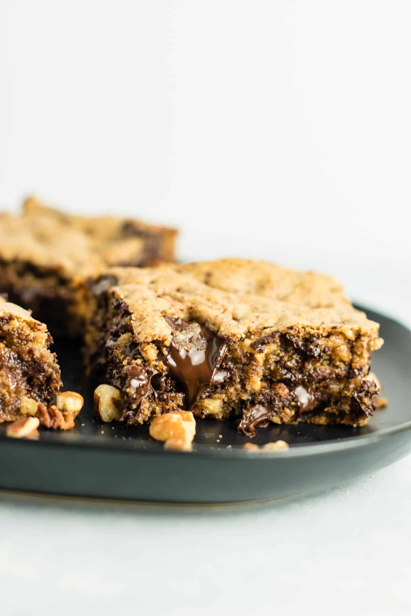 (Death by Chocolate) Dark Chocolate Pecan Cookie Bars recipe – gluten free and dairy free. You won’t believe how good these are! Serve warm with a scoop of vanilla ice cream! #glutenfree #dairyfree #cookiebars #dessert #chocolate