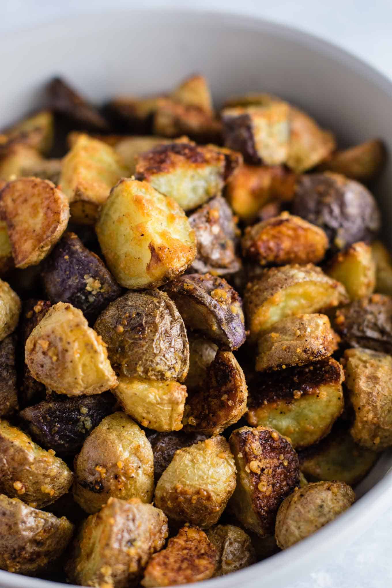 Garlic Parmesan Roasted Potatoes Recipe by Build Your Bite