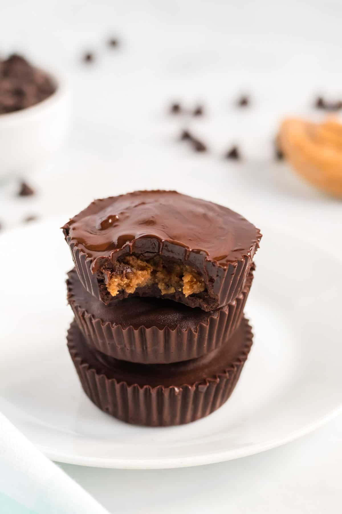 stacked peanut butter cups with a bite taken out