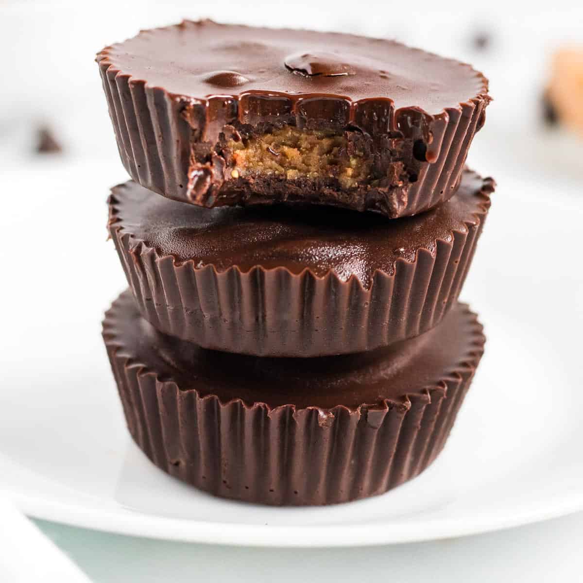 stacked peanut butter cups with a bite taken out