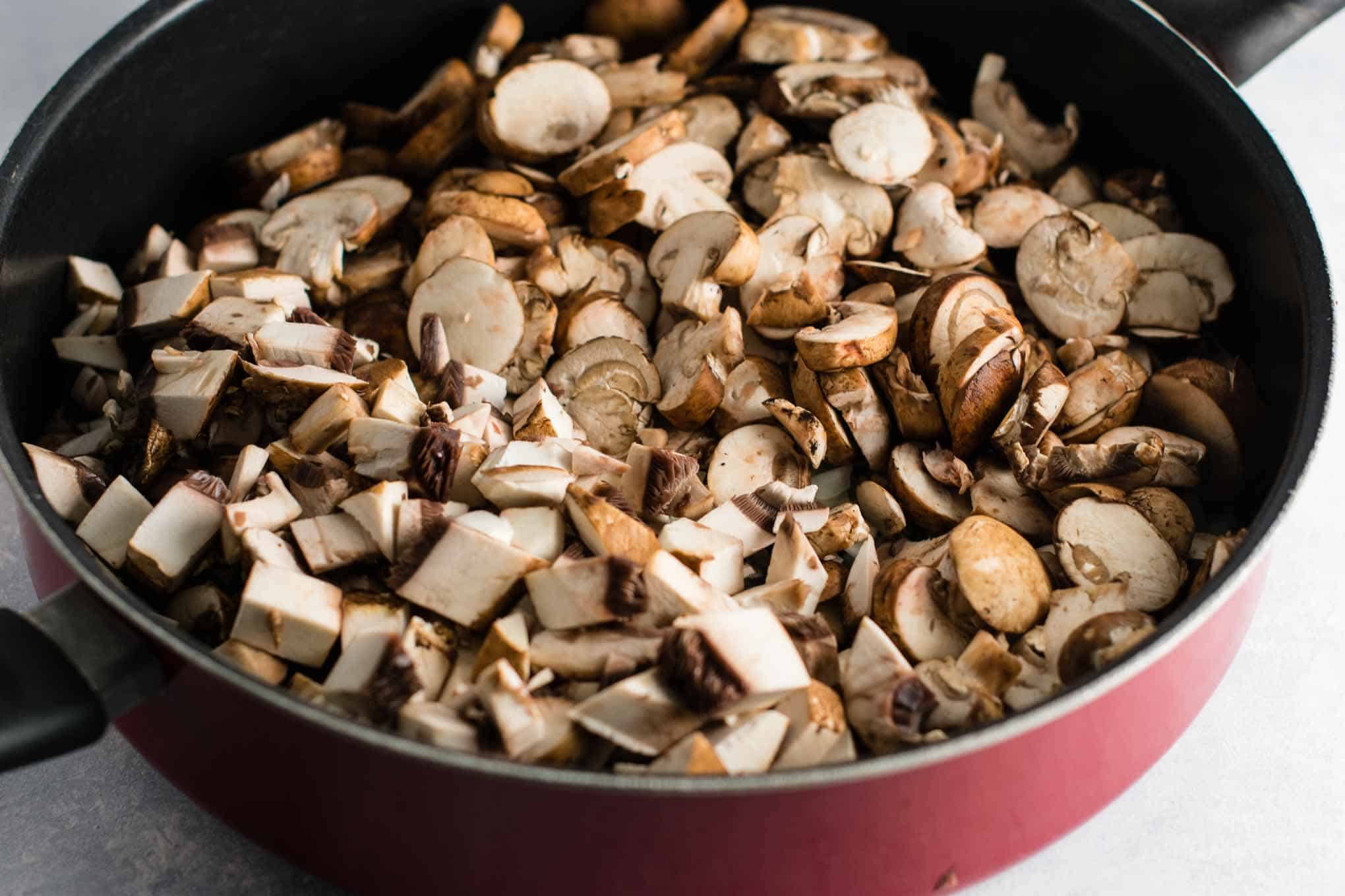 sliced baby bella mushrooms and chopped portobello mushrooms