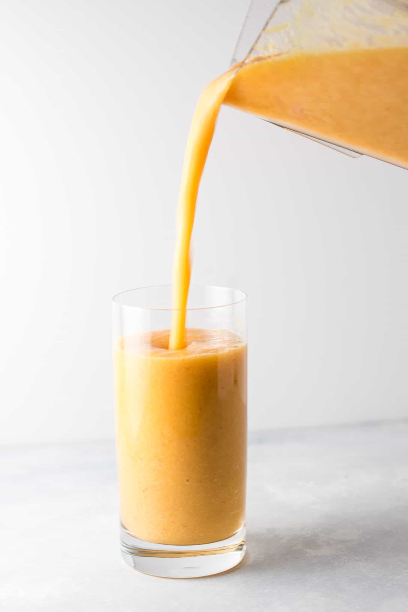 Ginger peach detox smoothie recipe with fresh cucumber and lemon. Packed full of healthy ingredients, naturally vegan, and so refreshing! #healthysmoothie #detoxsmoothie #gingerpeachsmoothie #vegan #smoothierecipes