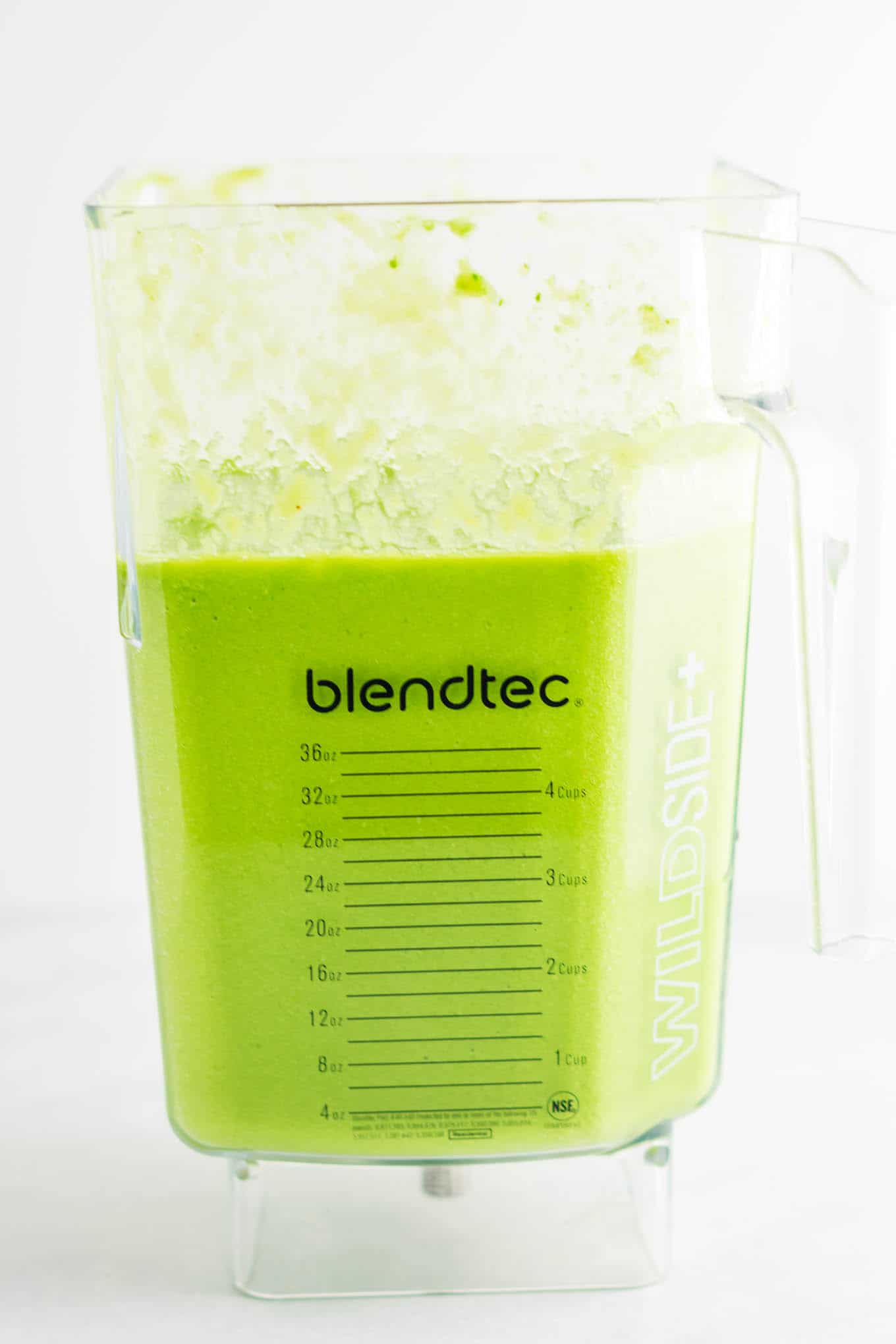 blender full of green smoothie