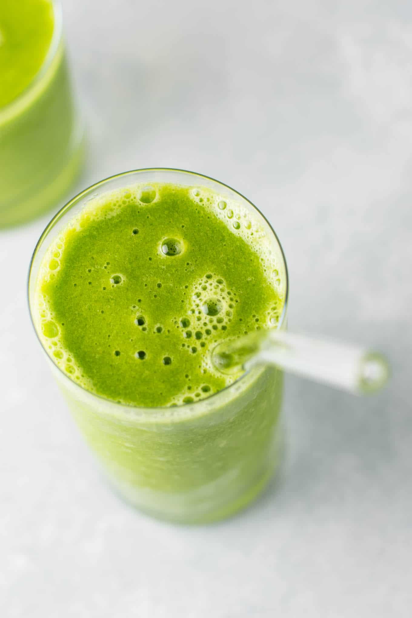 green smoothie in a glass from an overhead view