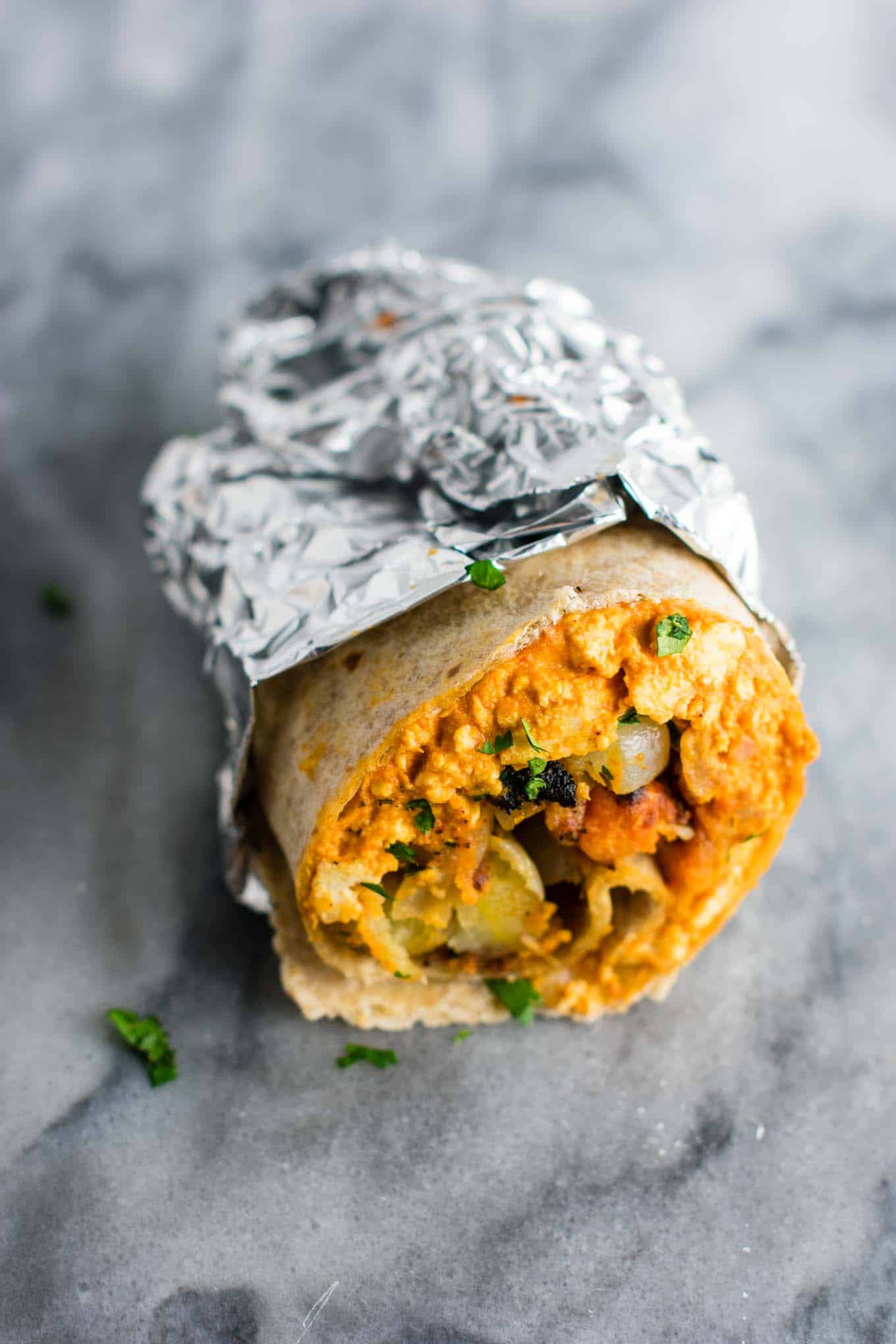 vegan breakfast burrito with foil
