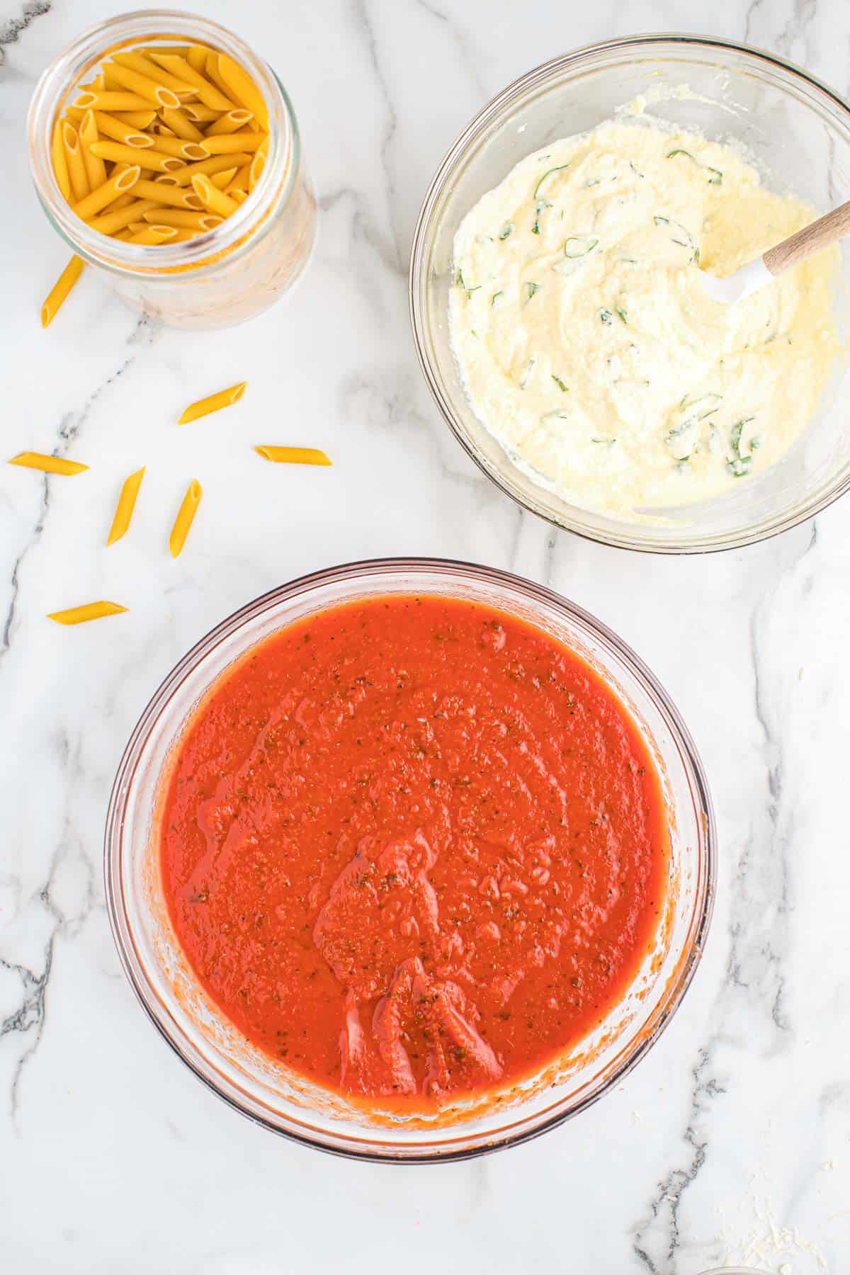 penne pasta, ricotta filling, and pasta sauce