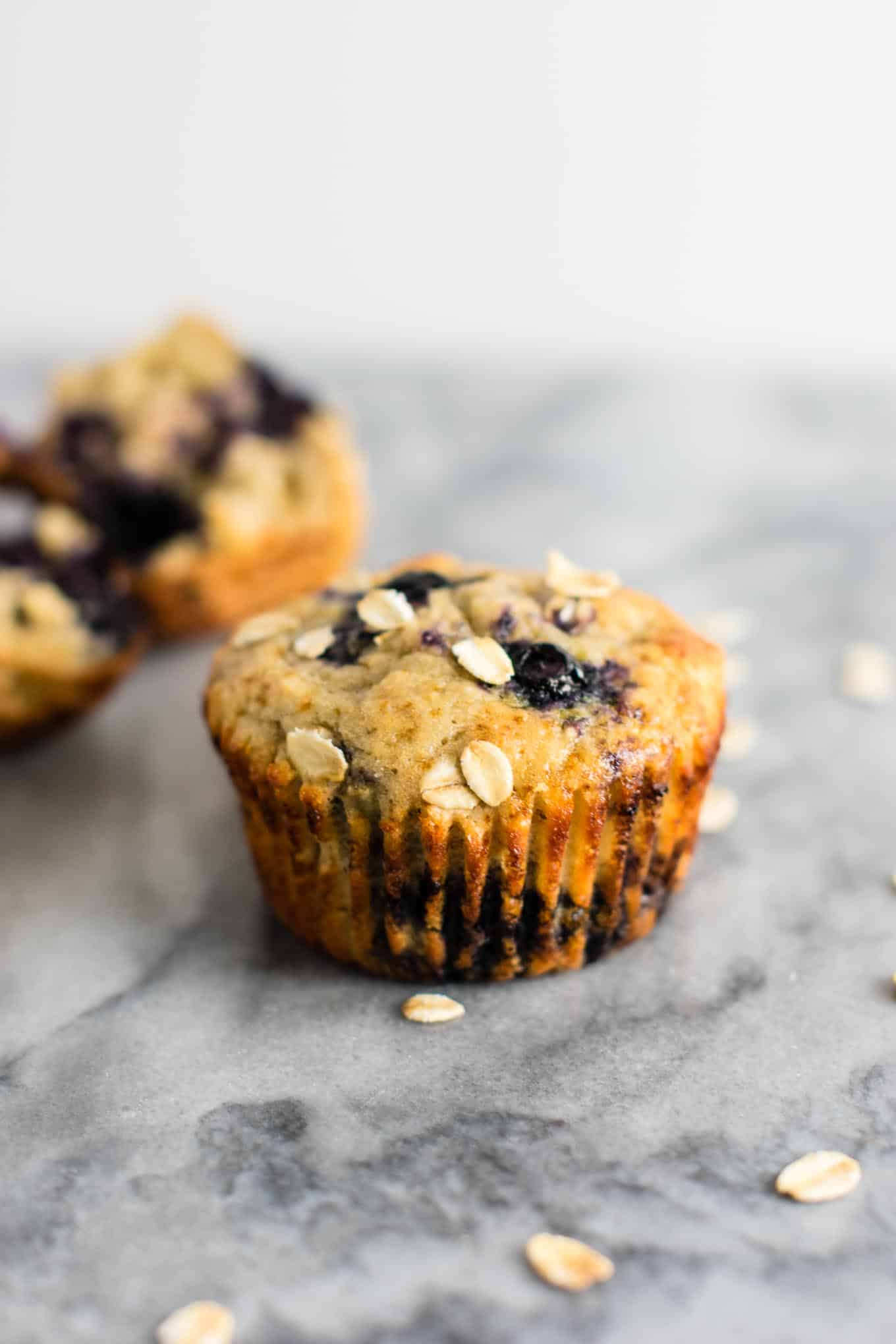 Healthy Blueberry Muffins with greek yogurt and coconut oil. Melt in your mouth crazy delicious! A protein packed healthy breakfast on the go. #healthyblueberrymuffins #blueberrymuffins #breakfast #greekyogurt #healthybreakfast