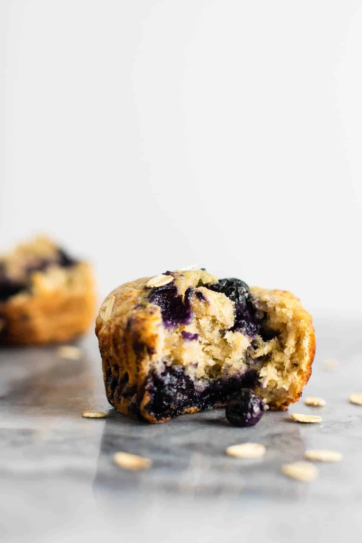 Healthy Blueberry Muffins with greek yogurt and coconut oil. Melt in your mouth crazy delicious! A protein packed healthy breakfast on the go. #healthyblueberrymuffins #blueberrymuffins #breakfast #greekyogurt #healthybreakfast