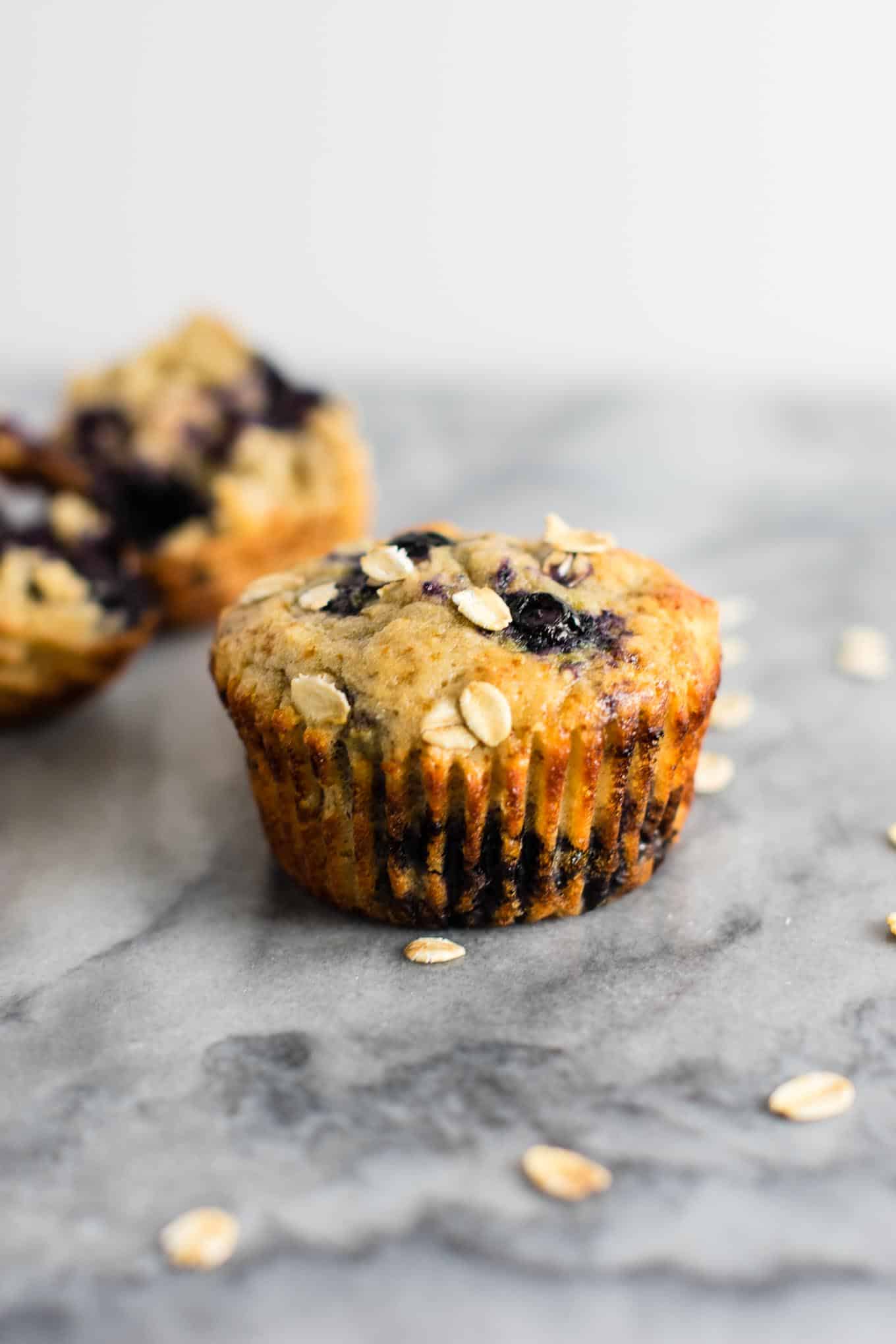 Healthy Blueberry Muffins with greek yogurt and coconut oil. Melt in your mouth crazy delicious! A protein packed healthy breakfast on the go. #healthyblueberrymuffins #blueberrymuffins #breakfast #greekyogurt #healthybreakfast