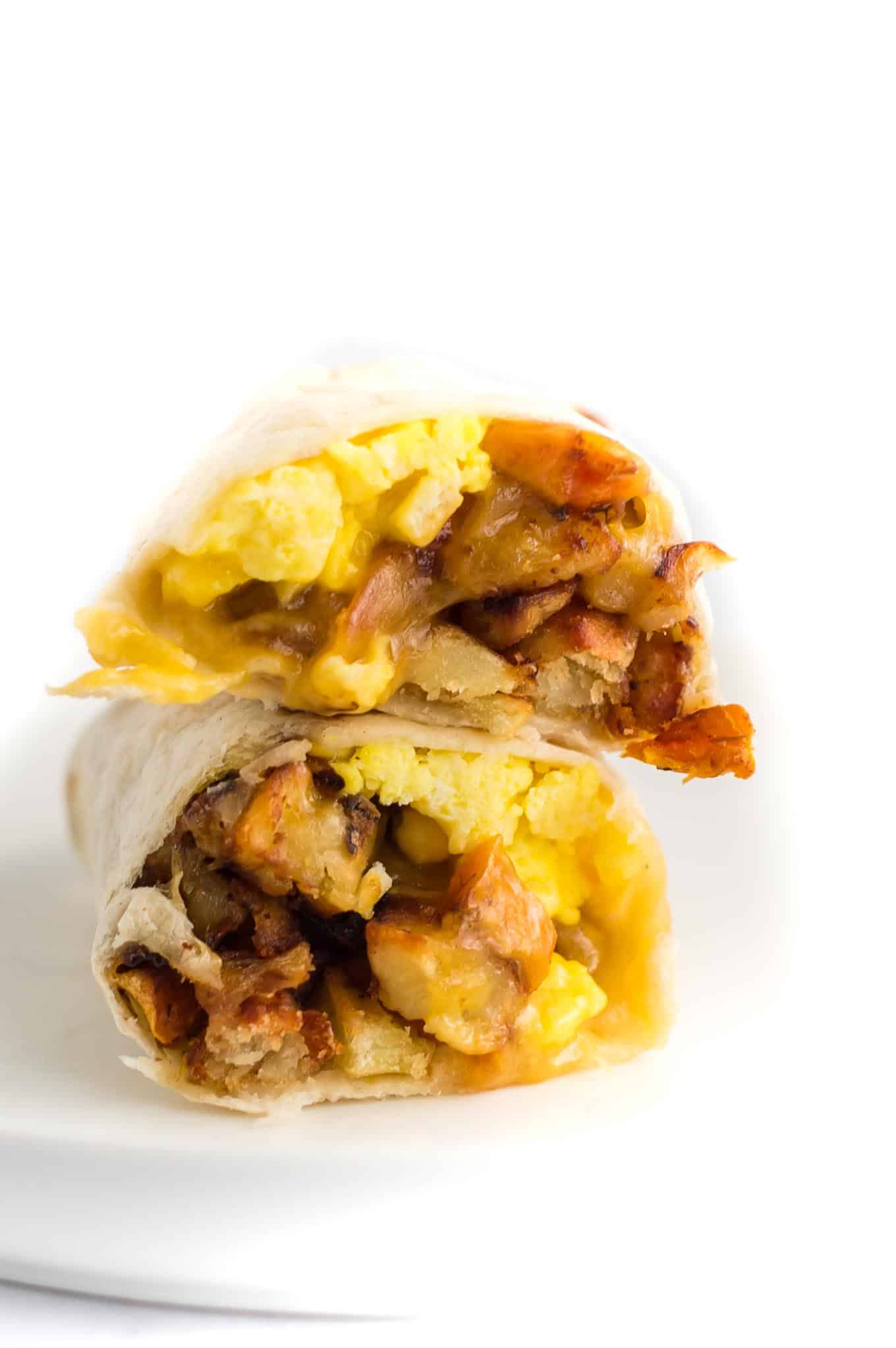 burrito cut in half stacked on top of each other