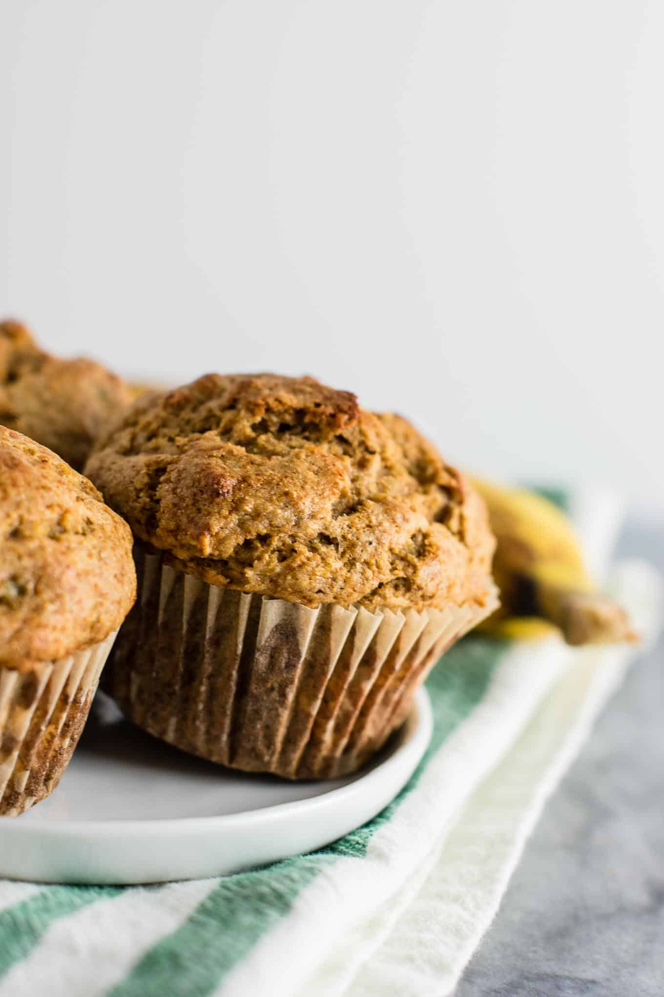 Whole Wheat Banana Bread Muffins Recipe (naturally sweetened) A wholesome snack or breakfast that both kids and adults will love! #wholewheat #bananabreadmuffins #healthybreakfast #muffins #bananabread