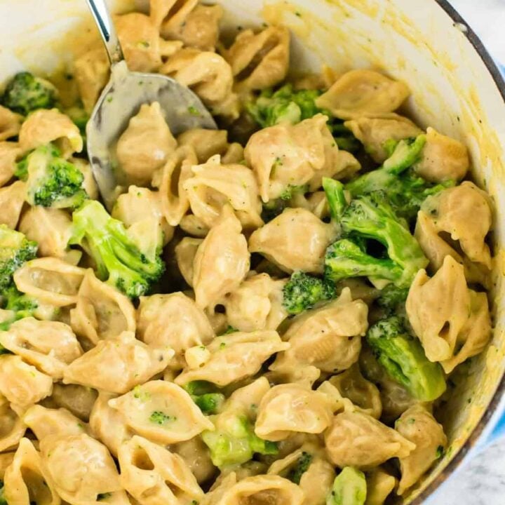 Lightened up broccoli shells and cheese with sharp cheddar cheese and whole wheat pasta. The healthiest way to justify eating macaroni and cheese for dinner. Kids will love this one! #broccolishellsandcheese #macandcheese #healthy #dinner #vegetarian #meatless #pasta #wholewheat