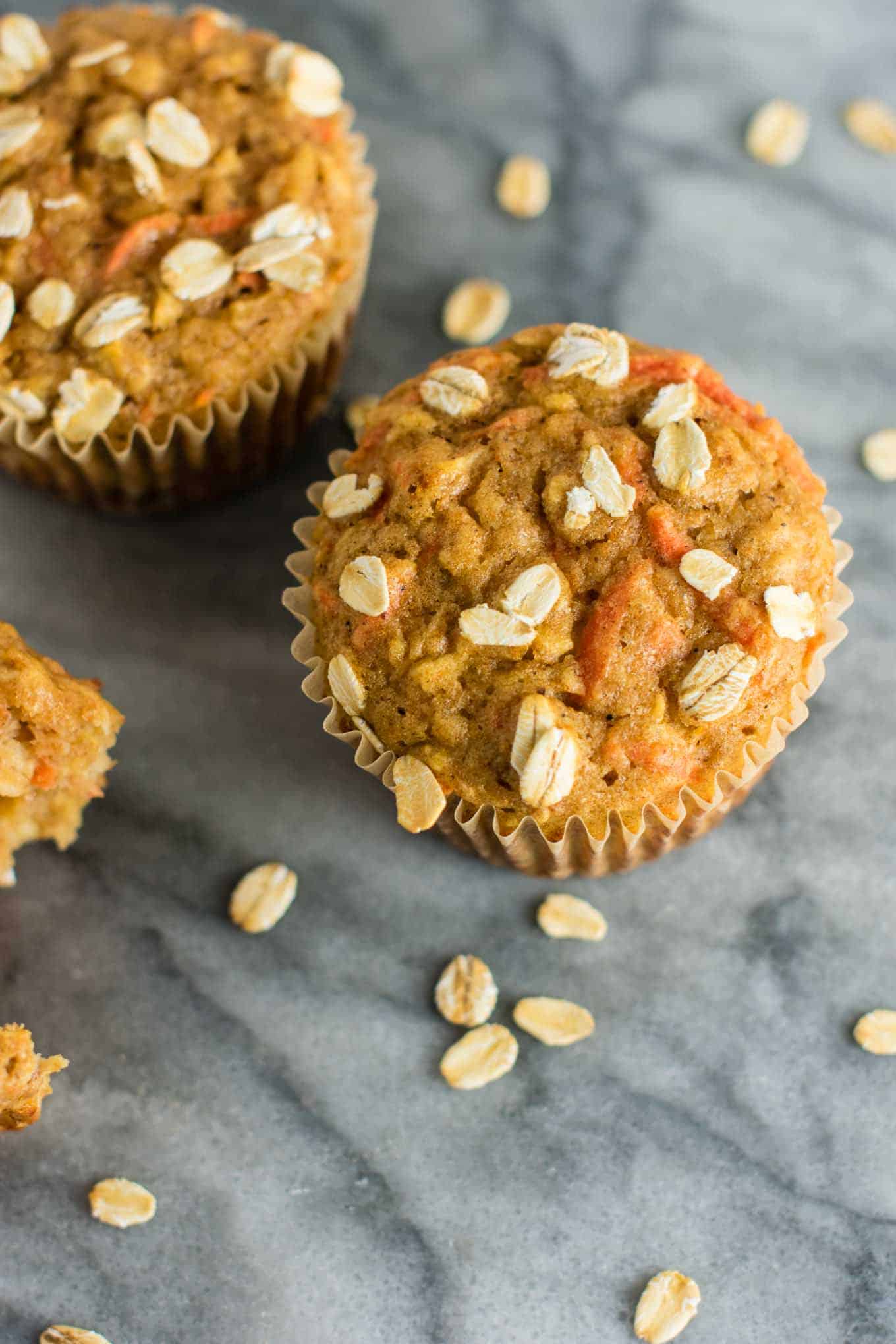 Wholesome Carrot Apple Muffins made with pure maple syrup and greek yogurt. Kids will love these! A feel good breakfast or snack for the whole family. (oil free, naturally sweetened) #carrotapplemuffins #healthymuffins #healthysnack #kidfriendlysnack #greekyogurt #vegetarian