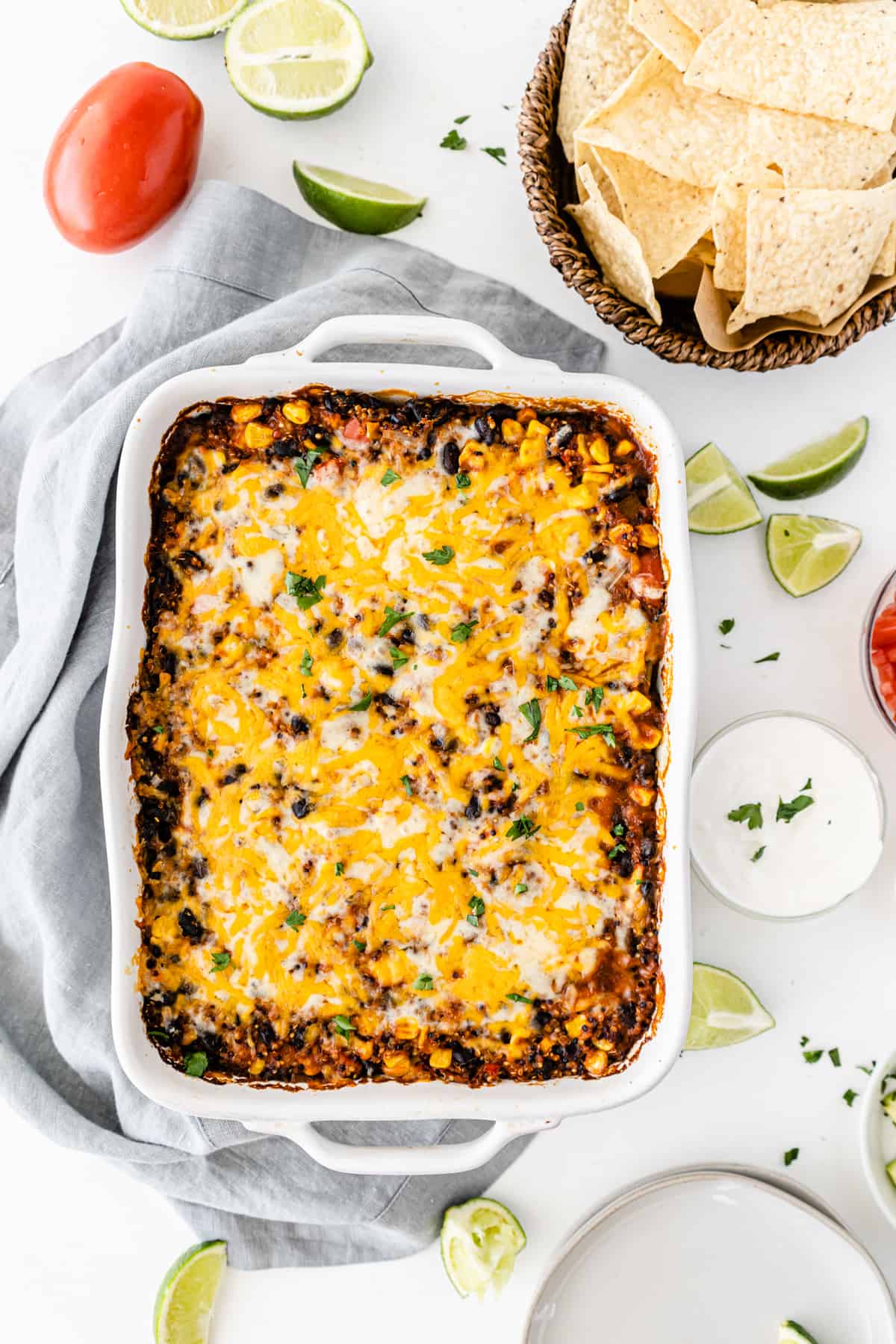 mexican quinoa casserole in a white baking dish