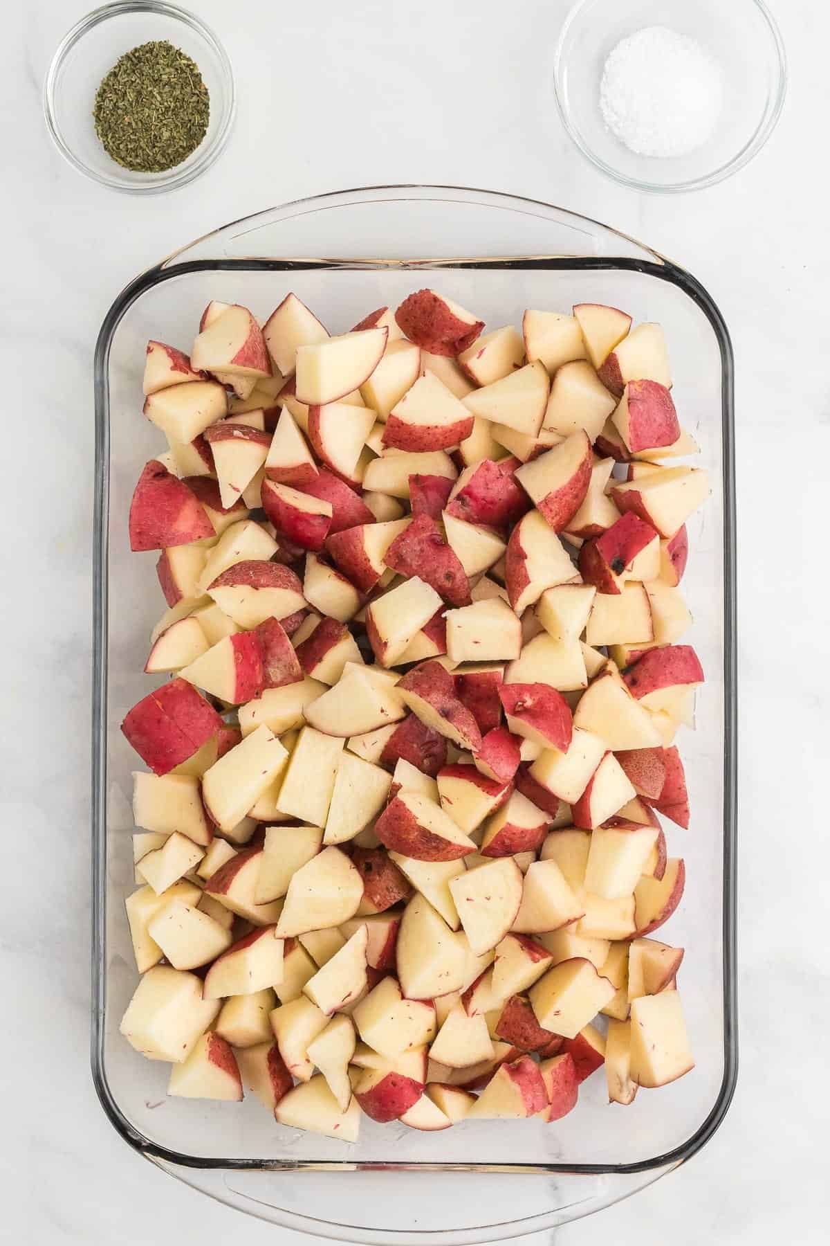 diced baby red potatoes in a baking dish