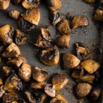 Quick and easy roasted mushrooms recipe. Perfect healthy side dish! #sidedish #roastedmushrooms #vegan #meatless #mushrooms #dinner #vegetables