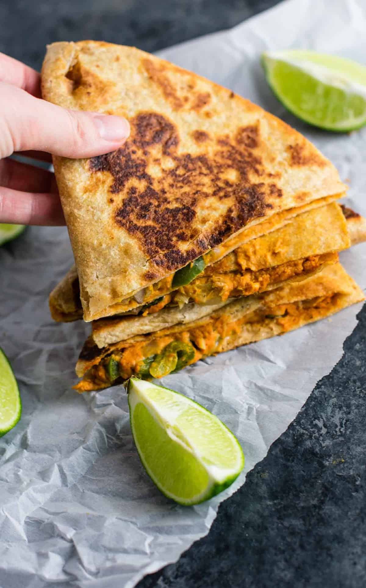 Easy vegan quesadillas recipe packed full of protein and flavor. No meat, no dairy, no vegan cheese! It's a Mexican favorite gone vegan! #vegan #quesadillas #meatless #veganmexican #veganquesadilla #dinner #recipes