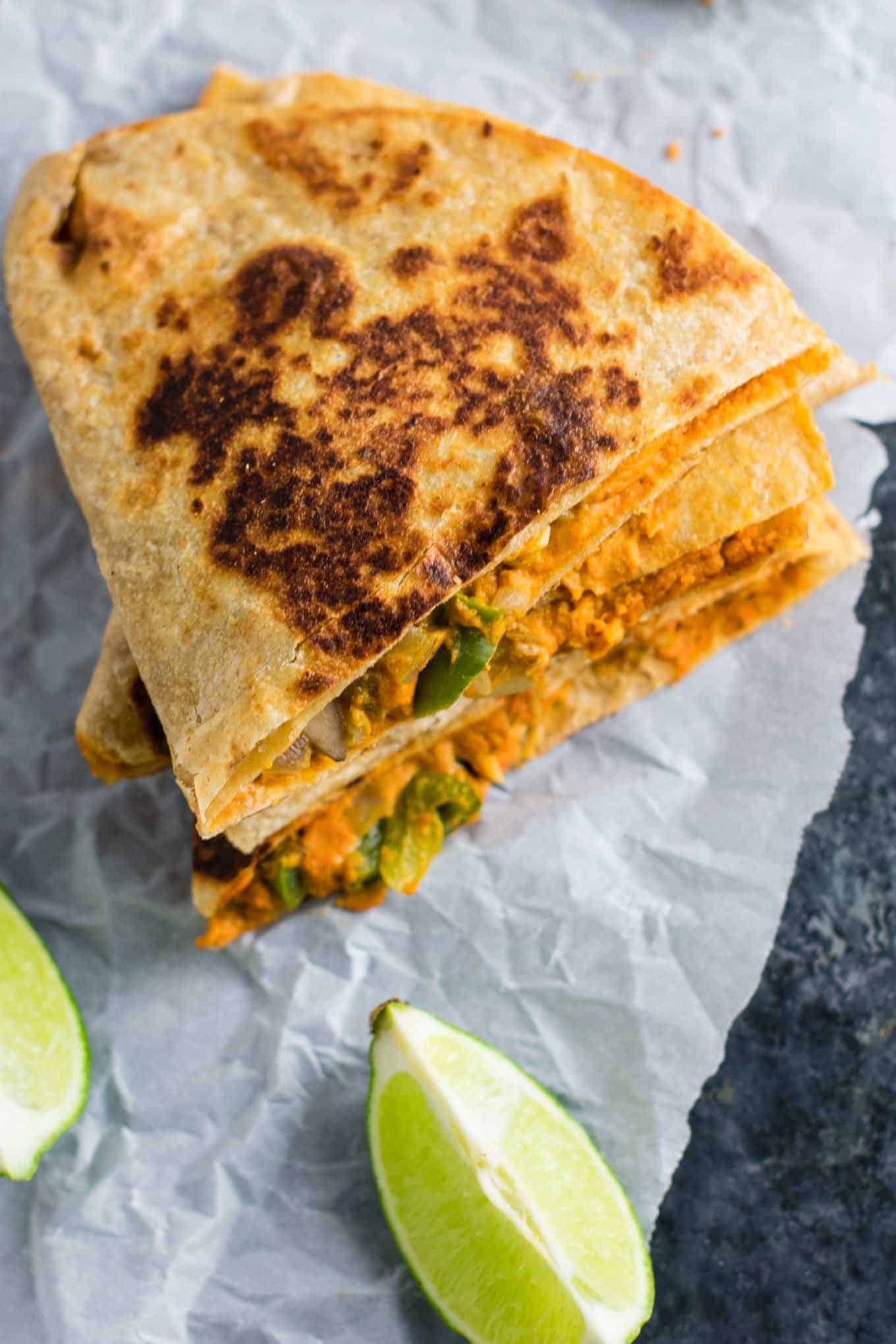 Easy vegan quesadillas recipe packed full of protein and flavor. No meat, no dairy, no vegan cheese! It's a Mexican favorite gone vegan! #vegan #quesadillas #meatless #veganmexican #veganquesadilla #dinner #recipes
