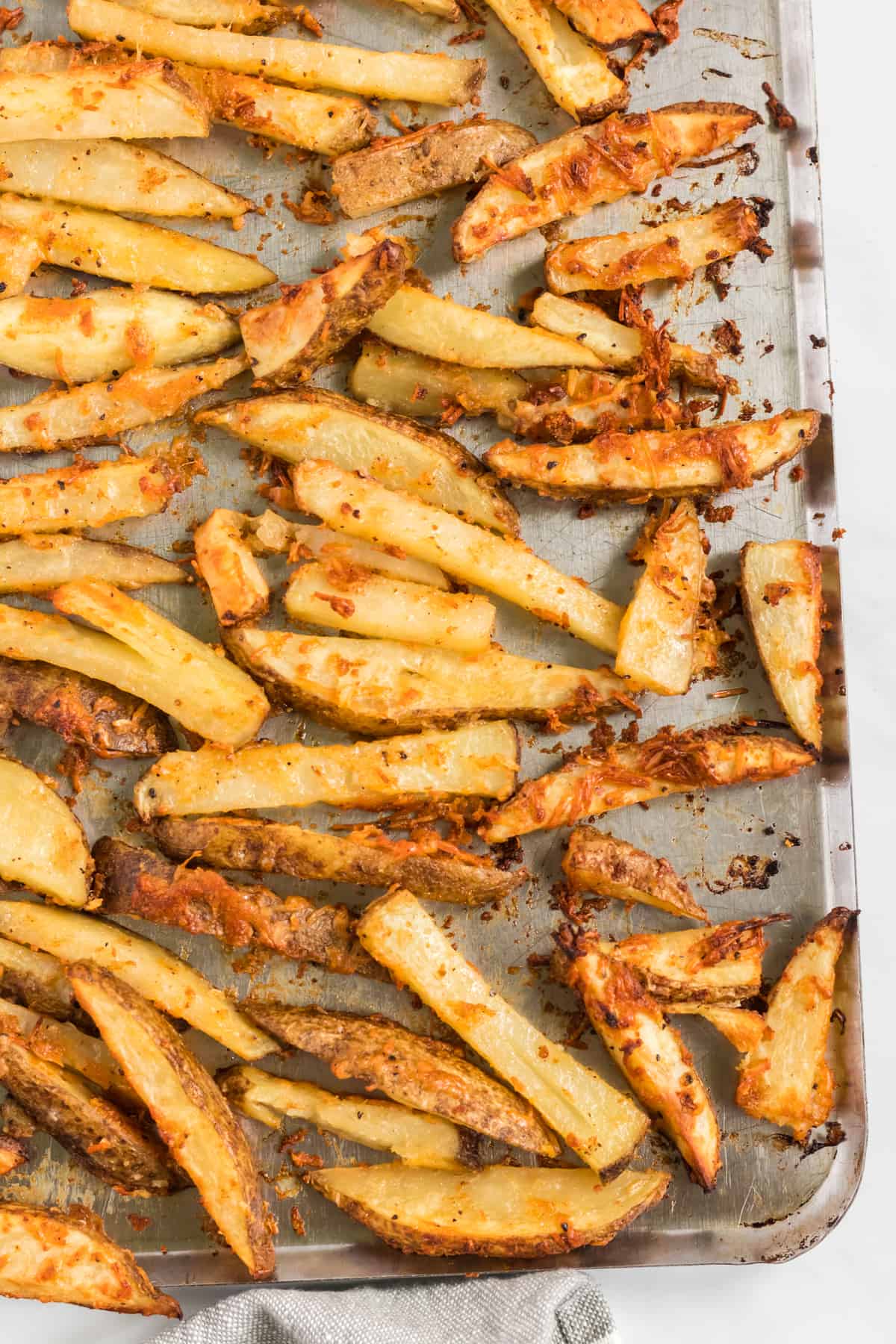 potato wedges on a baking sheet