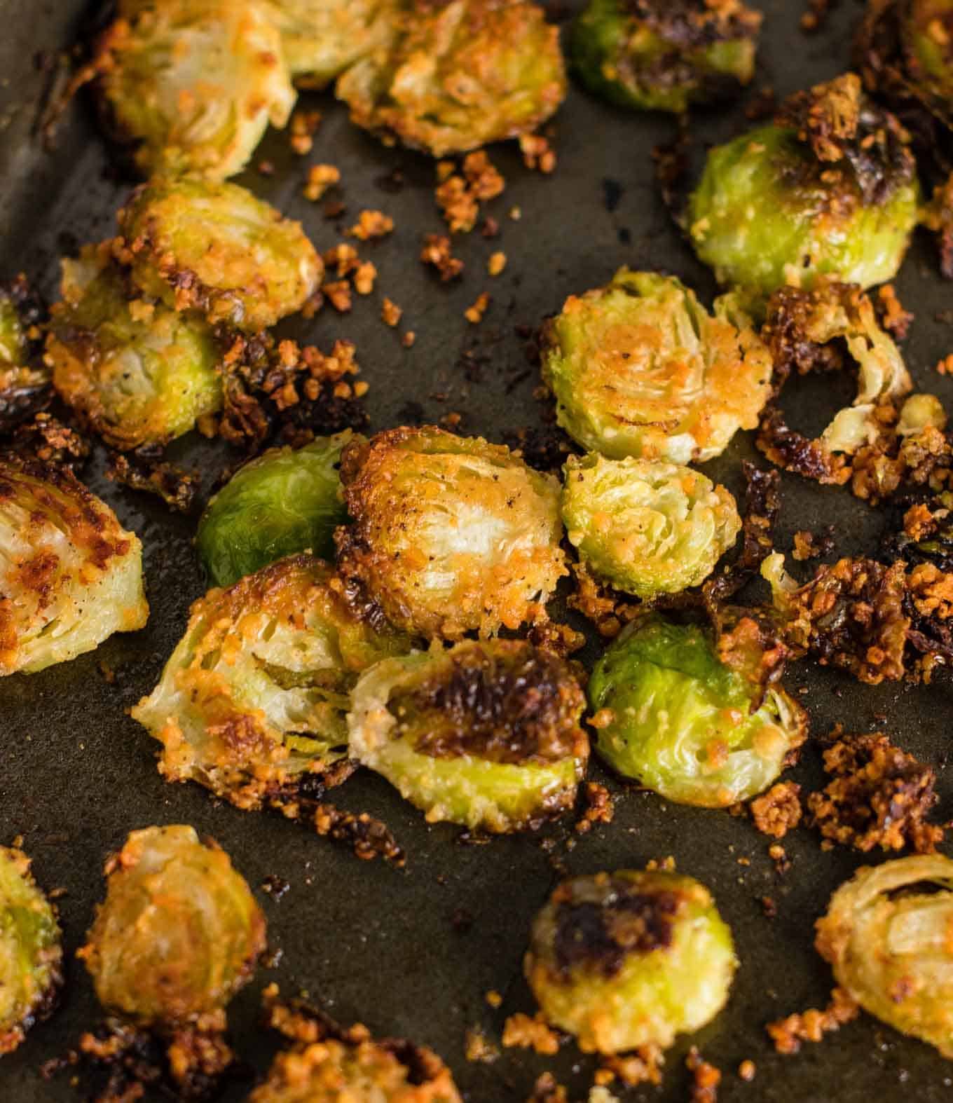 roasted brussel sprouts chips - these are so good I could eat the whole pan myself! #brusselsprouts #brusselsproutchips #dinner #sidedish #vegetarian