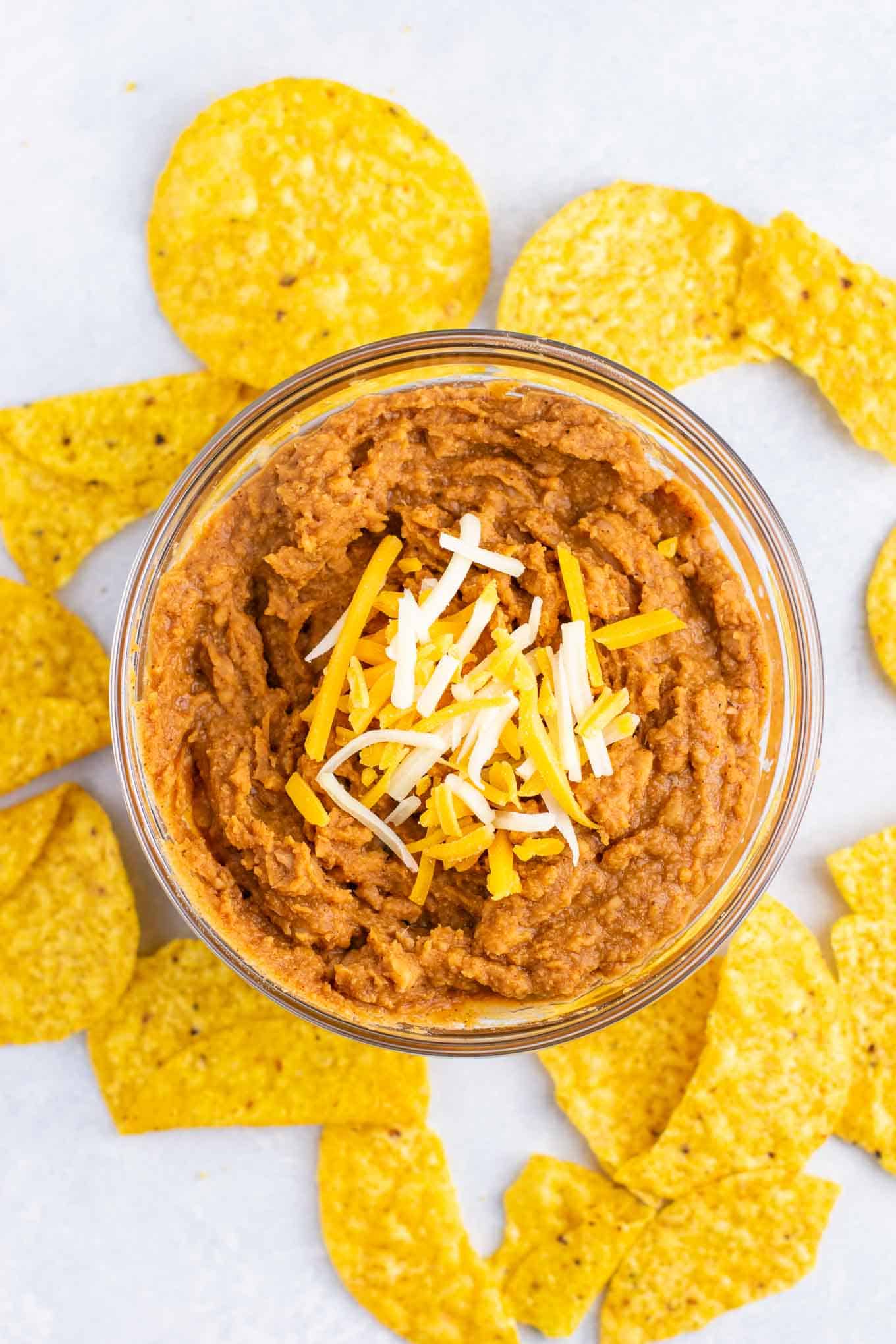 How to make refried beans (5 minute refried beans recipe) - so easy and I make these all the time! #refriedbeans #easyrecipe #mexican #homemaderefriedbeans #vegan #vegetarian #dinner #dinnerrecipe